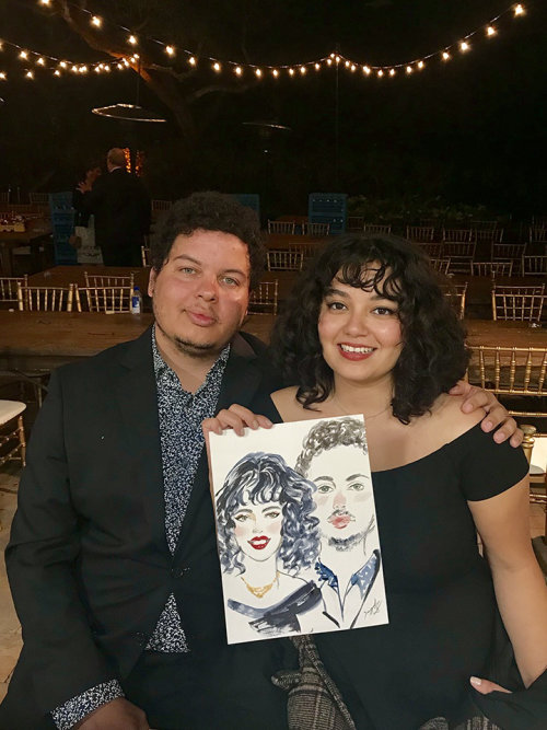 Live event drawing of couple in black dress
