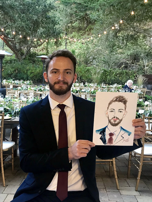 Live event drawing of man in suit
