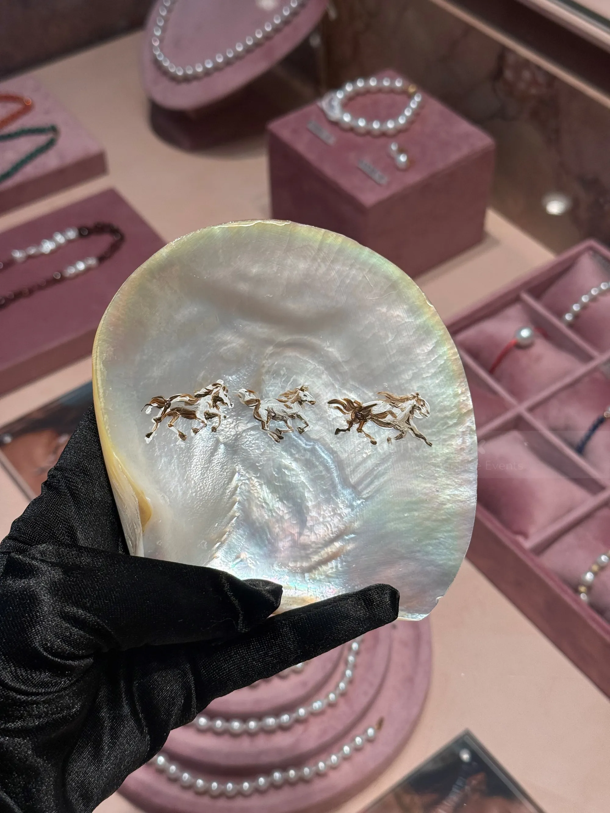 Hand-painted horses on a mother-of-pearl shell by Sunwoo Mansour