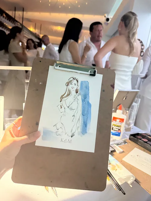 Live guest sketching at elegant pre-wedding event by Sunwoo Mansour