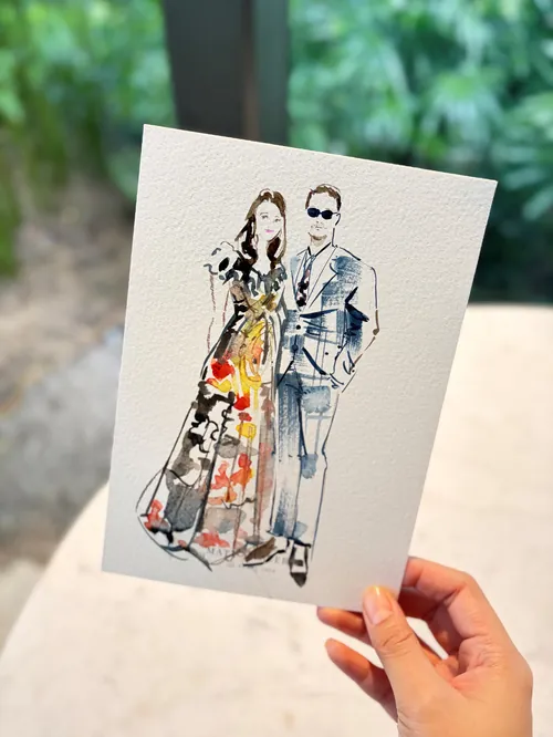 Hand holding a wedding couple sketch by Sunwoo Mansour
