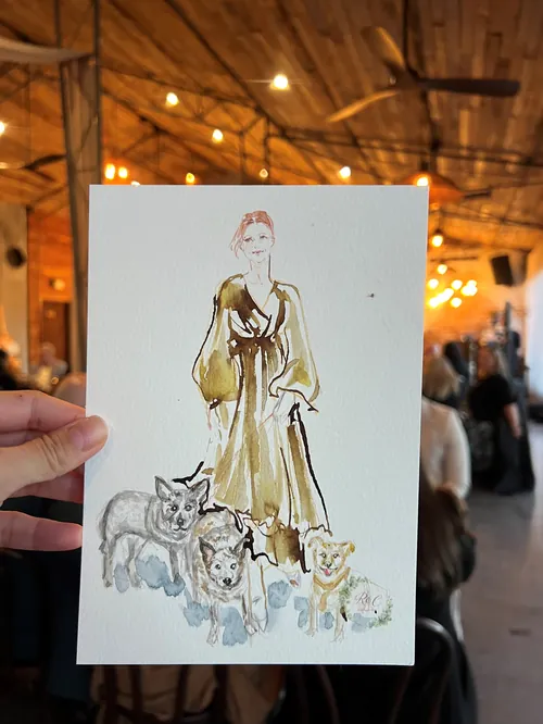 Live wedding guest sketch of woman with four dogs by Sunwoo Mansour