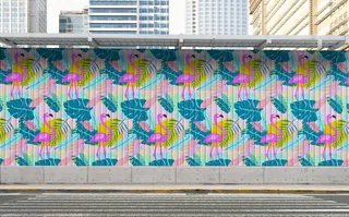 Colorful flamingo and tropical leaf mural on city wall by Superama