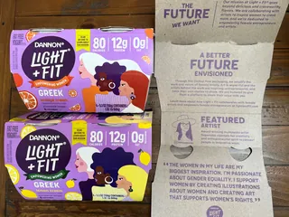 Dannon Light + Fit Greek yogurt four-pack container with calorie and protein info