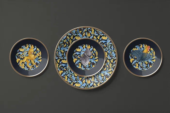 Decorative plates featuring intricate floral and animal designs by Svetlana Molodchenko