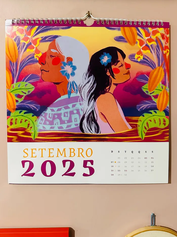 Colorful September 2025 calendar with artistic illustration of two women