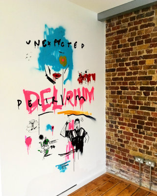 Live event drawing drelrum on wall
