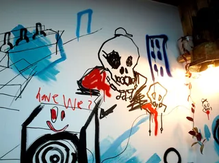 Mural with skulls and abstract shapes by Tallon Live Event Drawing