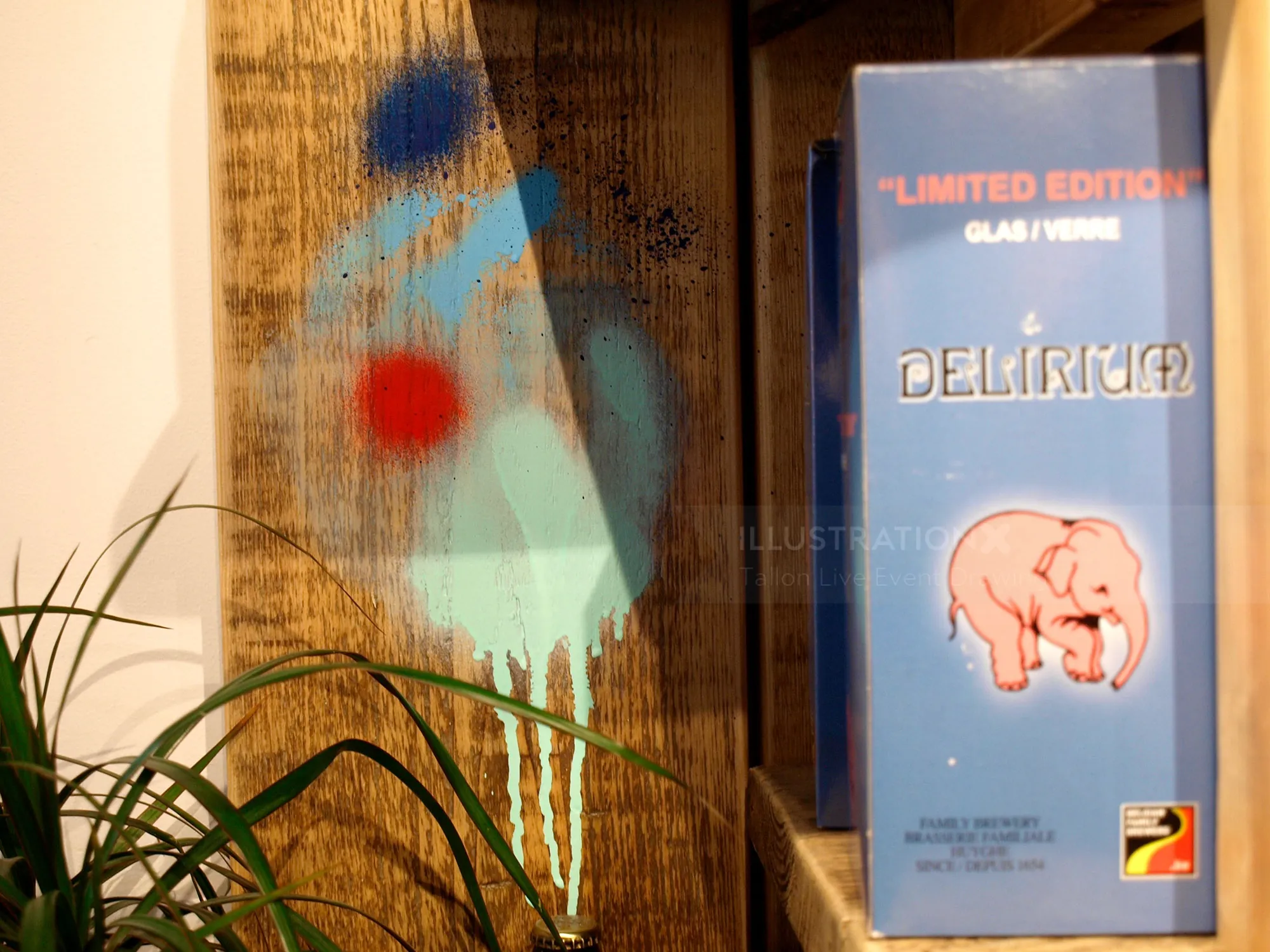 Mural with blue and red shapes and Delirium ale box by Tallon Live Event Drawing
