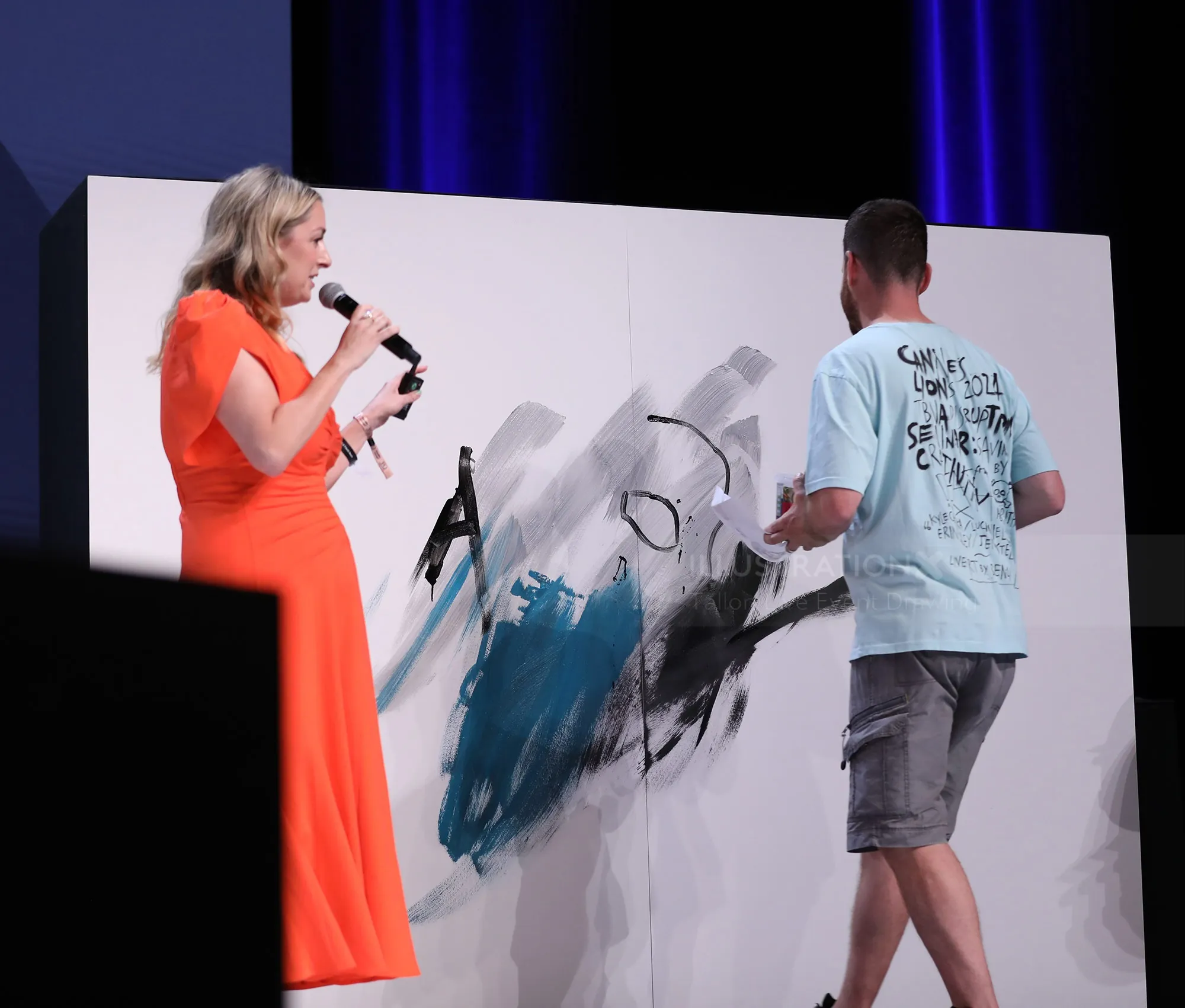 Artist painting live at Cannes Lions creativity seminar