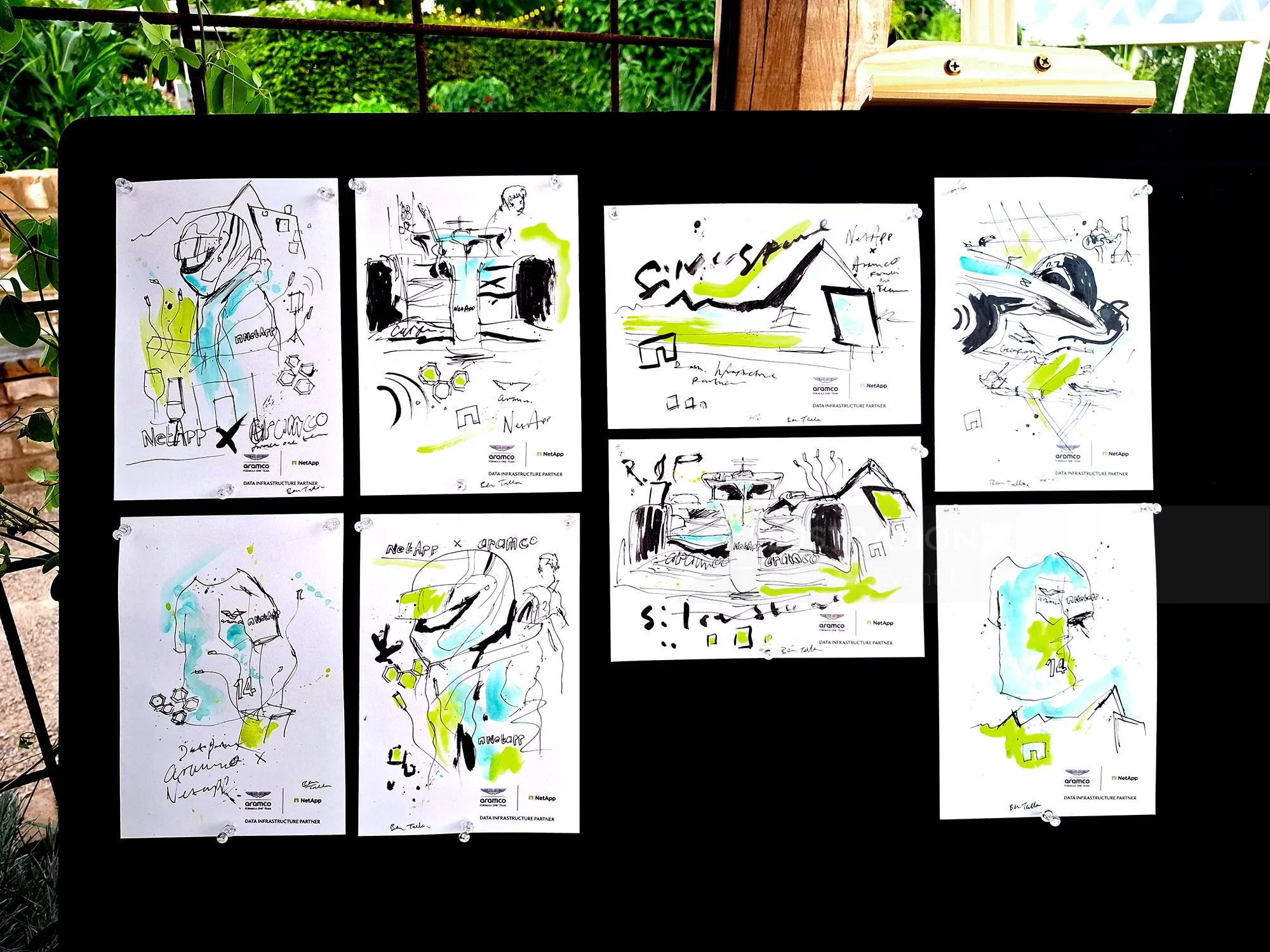 Tallon Live Event Drawing sketches of Aston Martin Formula 1 displayed on a wall