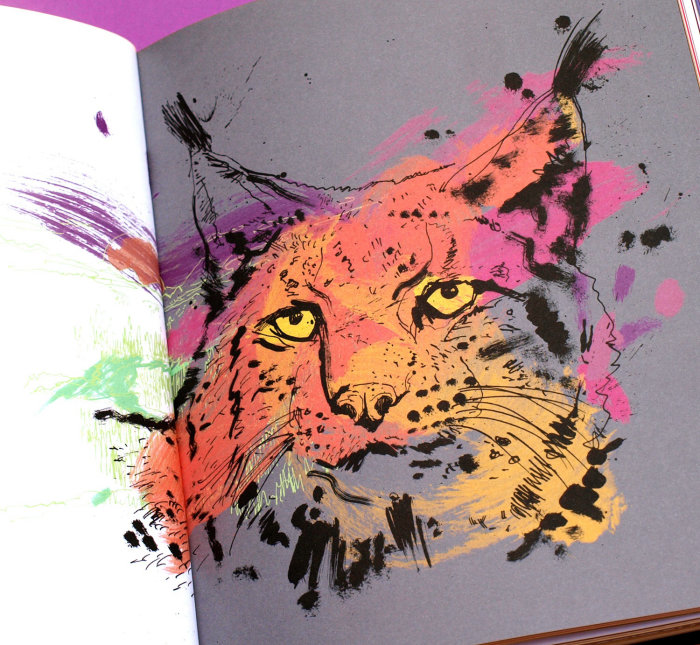 Un gato pintado en acuarelas brillantes.