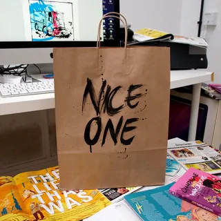 Nice one lettering on carrying bag by Tallon Type