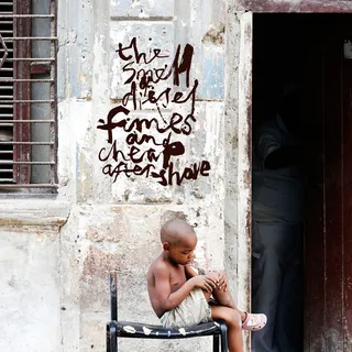 Graphic boy sitting on chair
