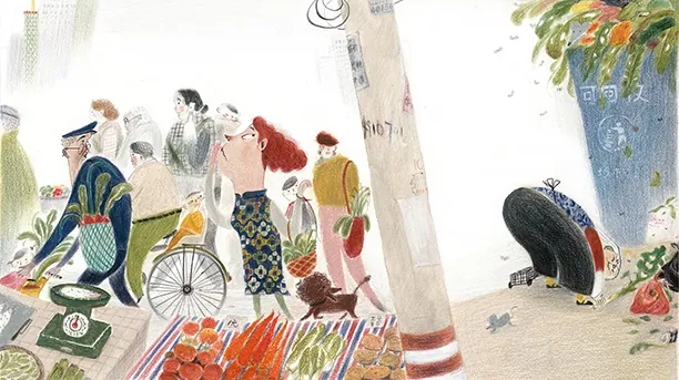 People walking by a market stall with various goods displayed.