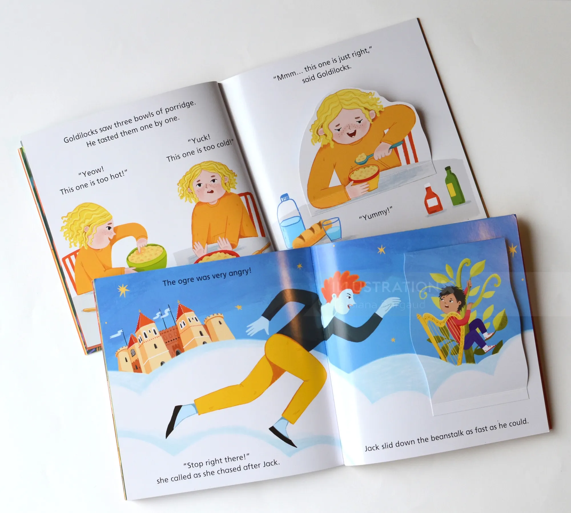 Open illustrated children's books with colorful story scenes