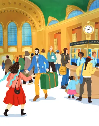 Busy train station interior with travelers and luggage