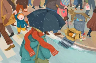 Person holding umbrella and scarf walking in busy street with people