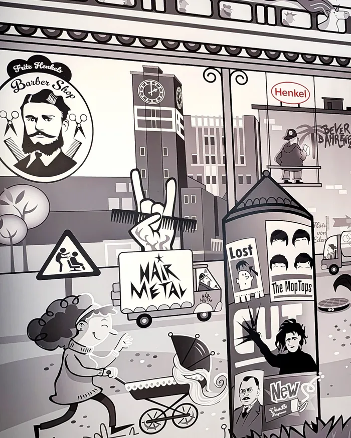 Black and white mural showing urban scenes with musicians, barber shop, and city icons