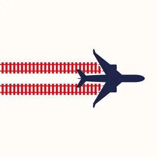 Silhouette of airplane flying above red train tracks by Tim Weiffenbach