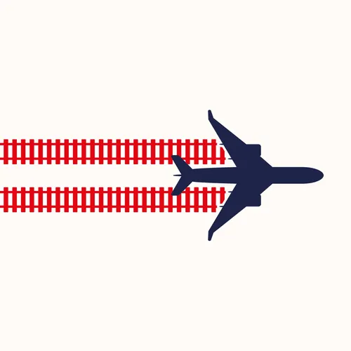 Silhouette of airplane flying above red train tracks by Tim Weiffenbach