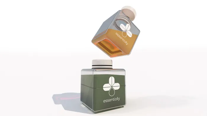 Two Essentially branded bottles floating, one gray and one green by Timo Müller