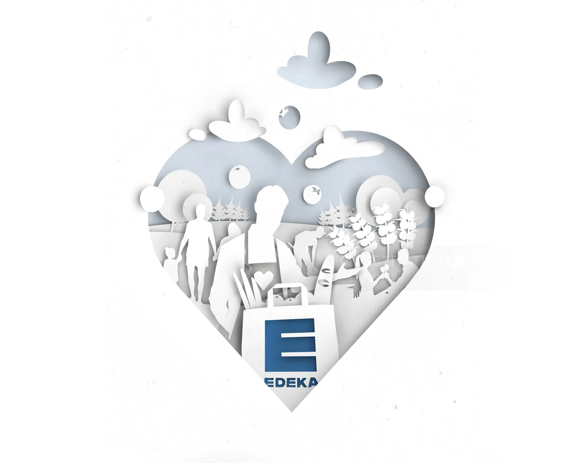 Heart-shaped paper cutout art with EDEKA logo and figures by Timo Müller