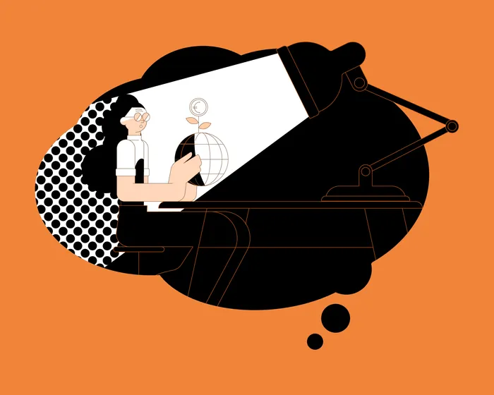 Person drawing a globe with geometric shapes in black and orange