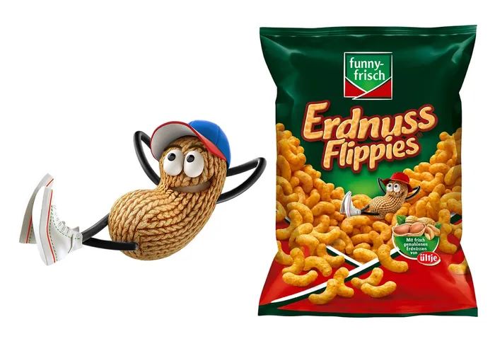Peanut mascot with shoes beside funny-frisch Erdnuss Flippies snack bag, by Tobias Wüstefeld