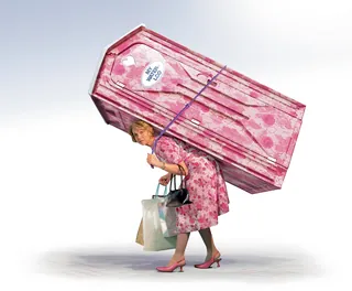 Woman in pink dress carrying large pink coffin on back by Tom Krieger
