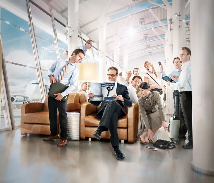 Office meeting with diverse employees working and discussing, by Tom Krieger