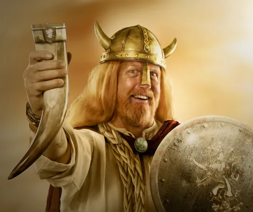 Viking warrior with horned helmet holding a drinking horn and shield by Tom Krieger