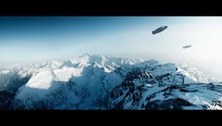 Airships flying over snowy mountains by Tom Krieger