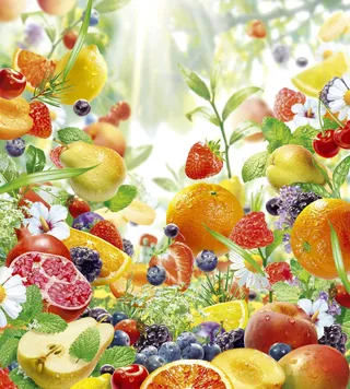 Colorful fresh fruits including oranges, strawberries, and blueberries by Tom Krieger