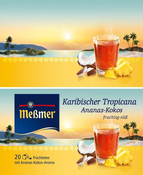 Glass of pineapple-coconut tea with fruits and Meßmer tea pack by Tom Krieger