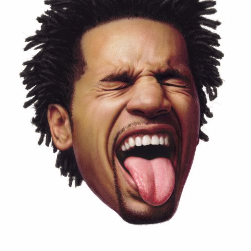 Man with dreadlocks making a funny face with eyes closed and tongue out by Tom Ungemach
