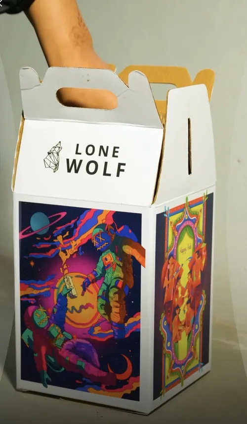 White packaging box with psychedelic artwork for Lone Wolf