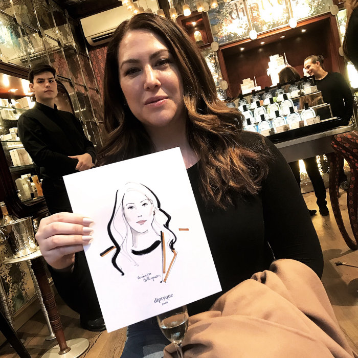 Live Event Drawing woman with her sketch
