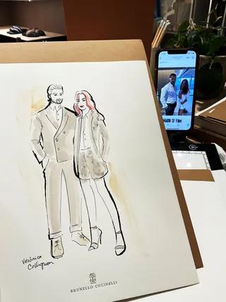 Drawing of a fashionable man and woman standing side by side.