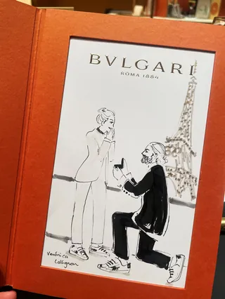 Sketch of person proposing marriage near Eiffel Tower