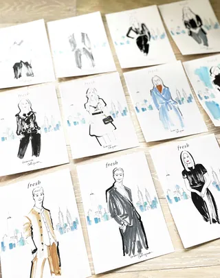 Fashion sketches featuring various outfits and poses on white sheets.