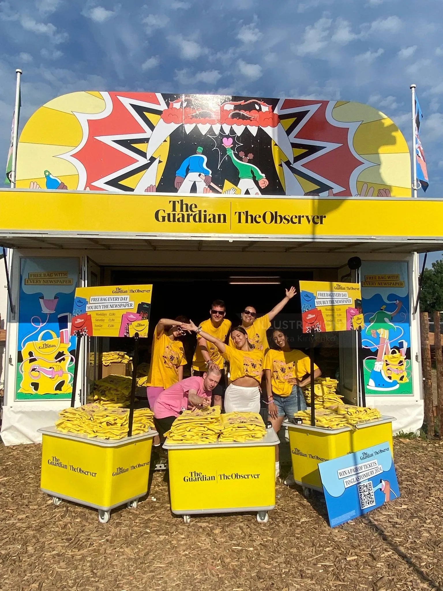 Festival trailer with staff in yellow shirts outside, photo by Veronika Kiriyenko