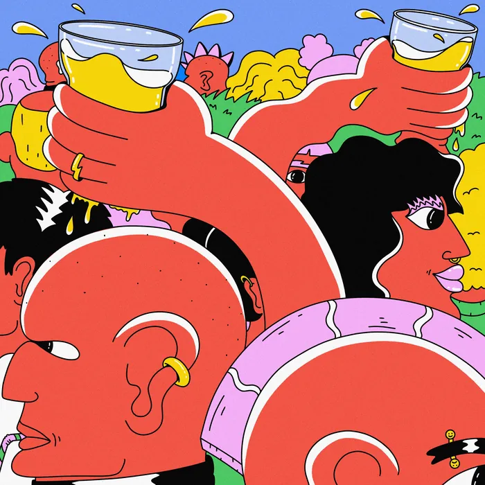 Two people in a colorful crowd clinking glasses of beer
