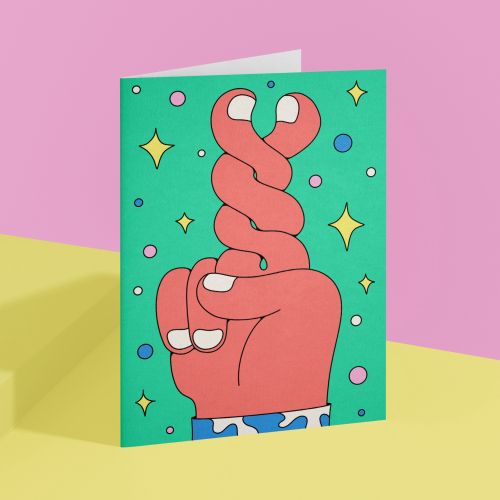 Illustration of a hand with crossed fingers on colorful card