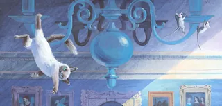 Cats play and climb upside down on a chandelier in a blue room