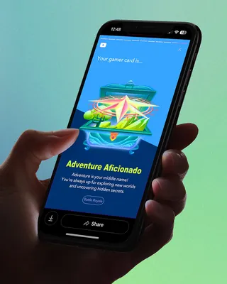 Smartphone screen showing Adventure Aficionado gaming achievement card