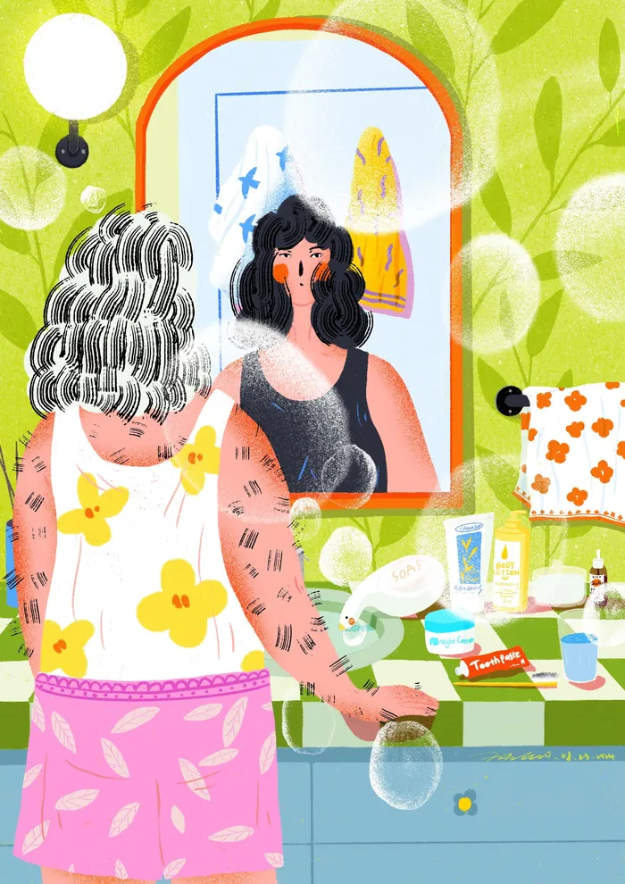 Woman looking at herself in a mirror in a colorful bathroom