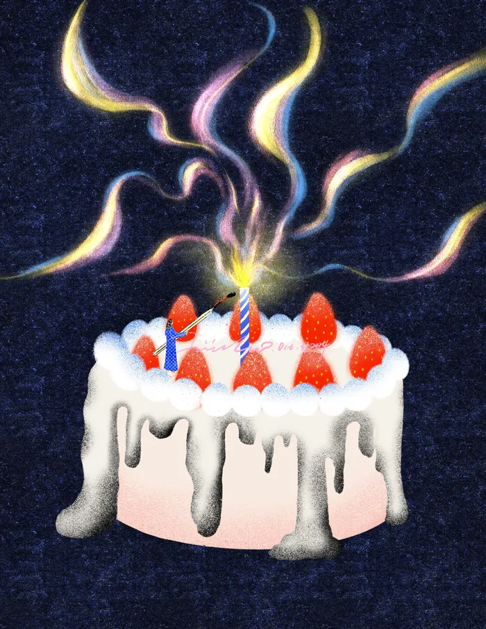 Birthday cake with strawberries, candles, and colorful smoke