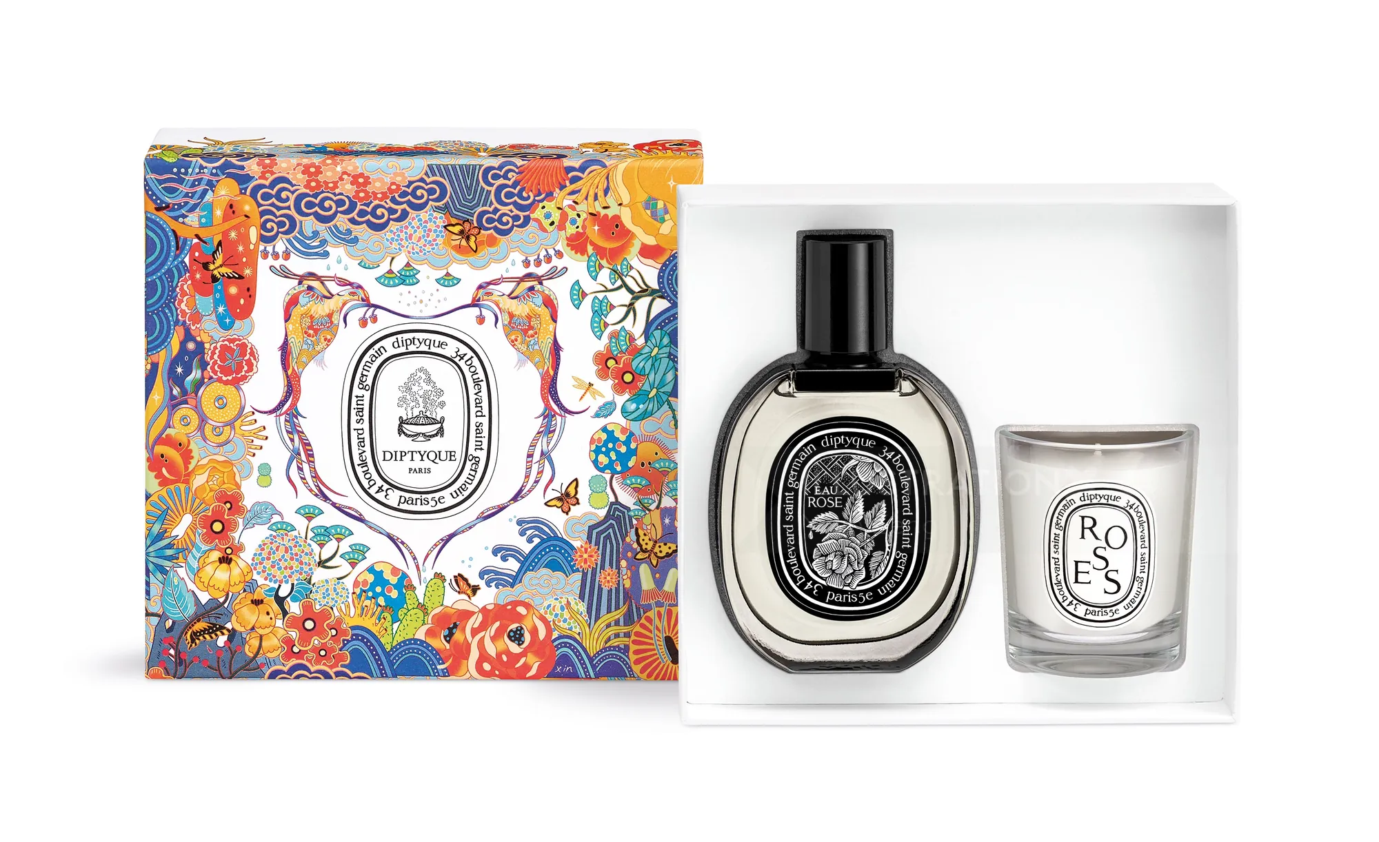 Fragrance bottle and rose candle in decorative floral gift box