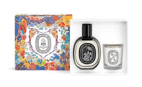 Fragrance bottle and rose candle in decorative floral gift box